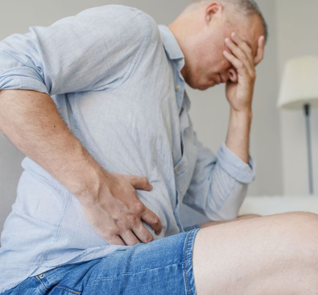Man with pain in his stomach